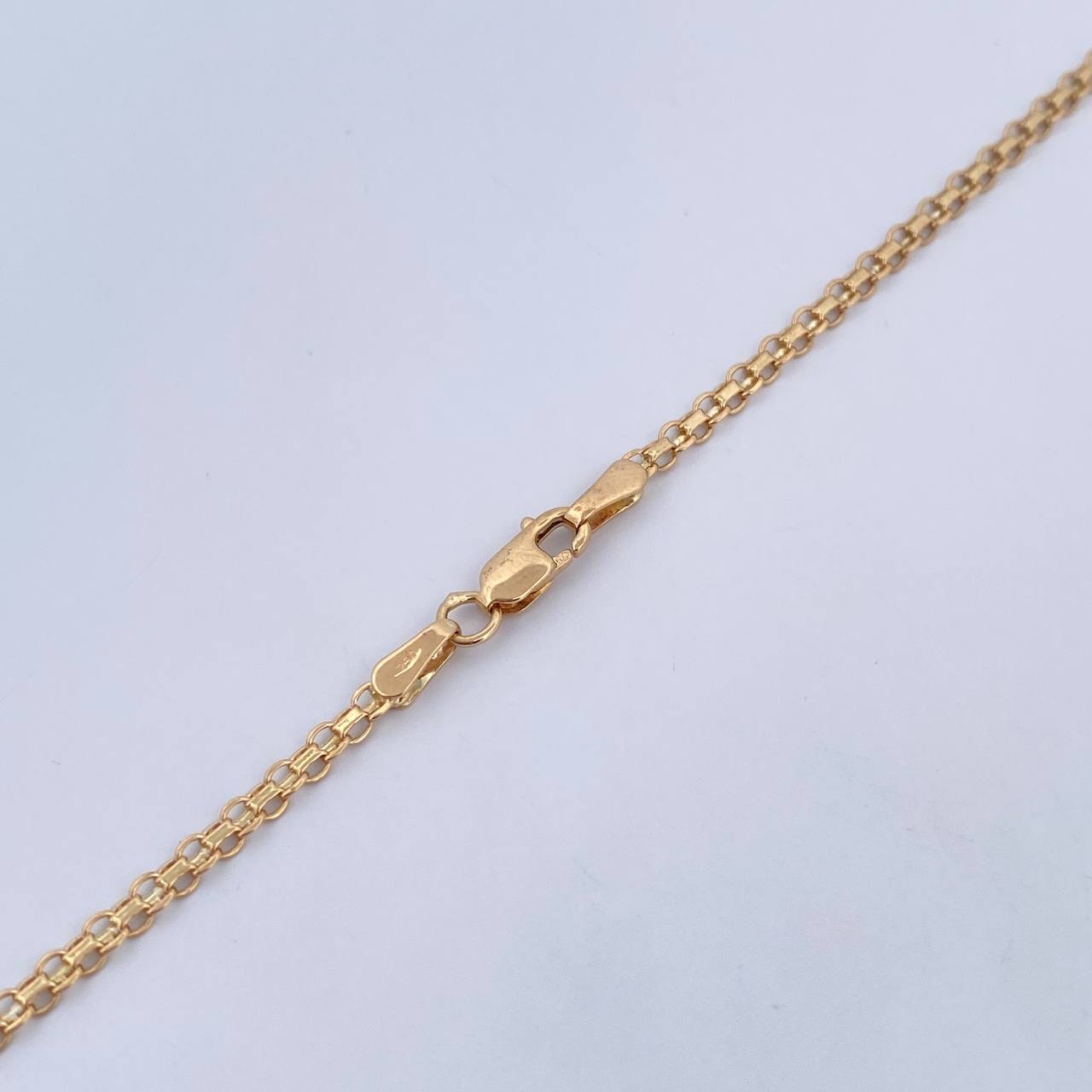 Cadena China 6.4gr / 57cm / 2mm Oro Amarillo +0 18K $