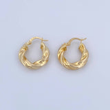 Candongas Cece 3.4gr / 2.2cm / Entorchada Oro Amarillo 18K &