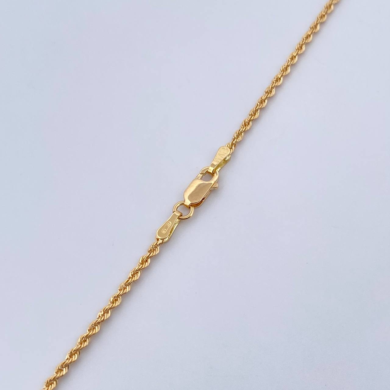 Set Cadena Lazo 2gr / 50.1cm / 1.4mm + Dije Divino Niño 0.5gr / 1.6cm Troquelado Oro Amarillo 18K (Oferta) $