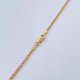 Set Cadena Lazo 2gr / 50.1cm / 1.4mm + Dije Divino Niño 0.5gr / 1.6cm Troquelado Oro Amarillo 18K (Oferta) $