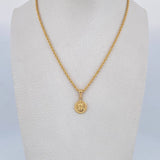 Set Cadena Lazo 2gr / 50.1cm / 1.4mm + Dije Divino Niño 0.5gr / 1.6cm Troquelado Oro Amarillo 18K (Oferta) $