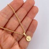 Set Cadena Lazo 2gr / 50.1cm / 1.4mm + Dije Divino Niño 0.5gr / 1.6cm Troquelado Oro Amarillo 18K (Oferta) $