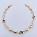Pulso Rustico Barril 4.75gr / 21.7cm / 5mm Canotillo Cauchos Negros Oro Amarillo 18K $