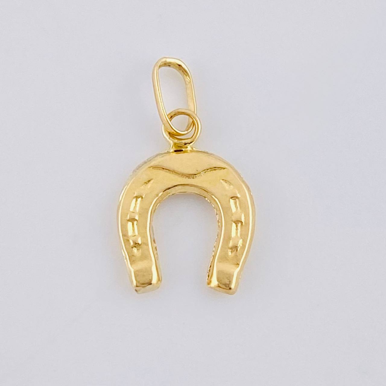 Dije Herradura 0.35 g / 1.5 cm Oro Amarillo 18K