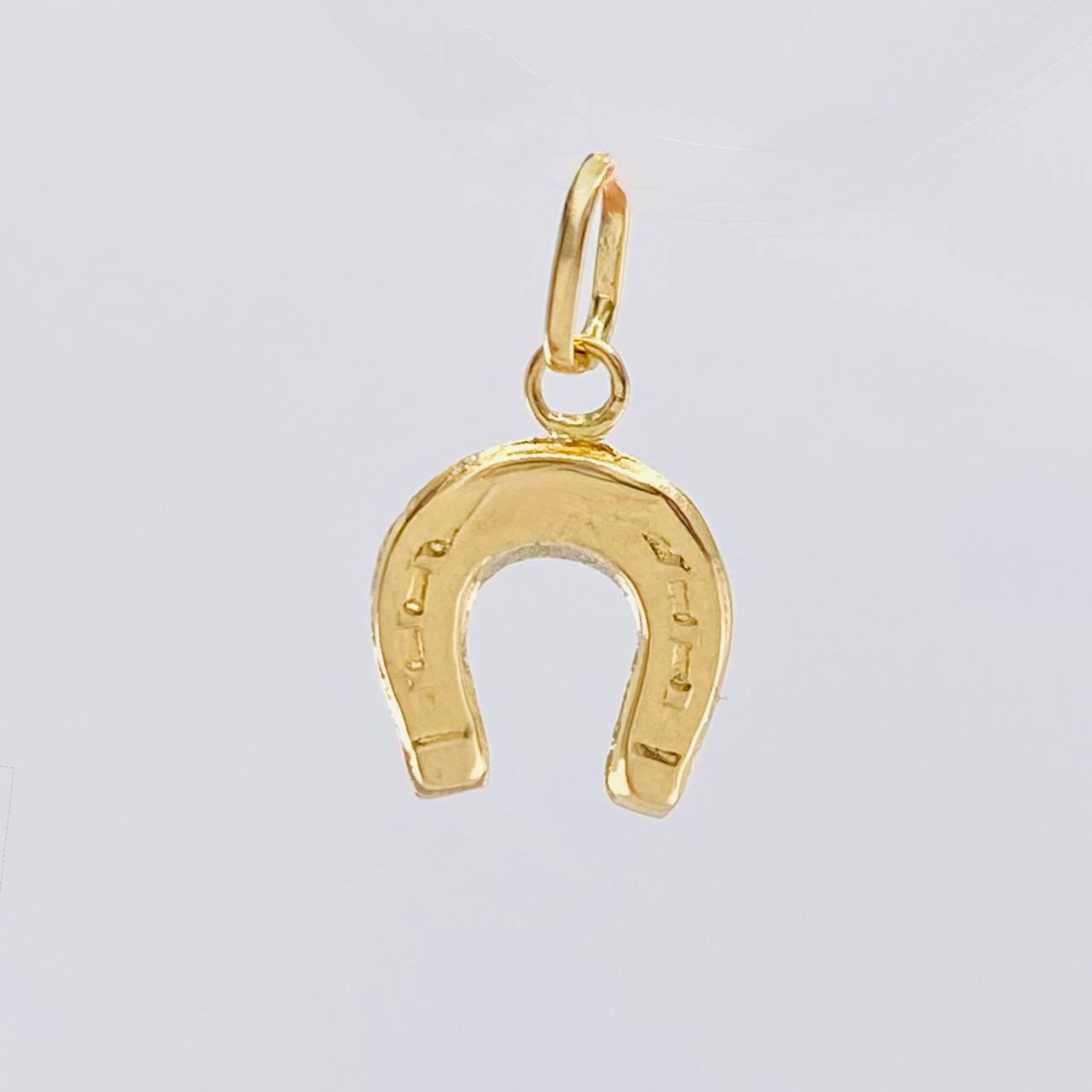 Dije Herradura 0.35 g / 1.5 cm Oro Amarillo 18K