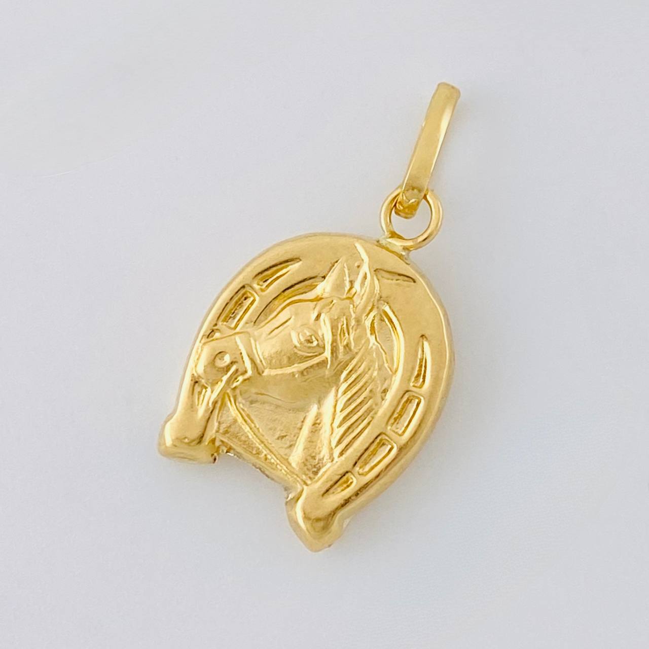Dije Herradura Caballo 0.7 g / 1.9 cm Oro Amarillo 18K