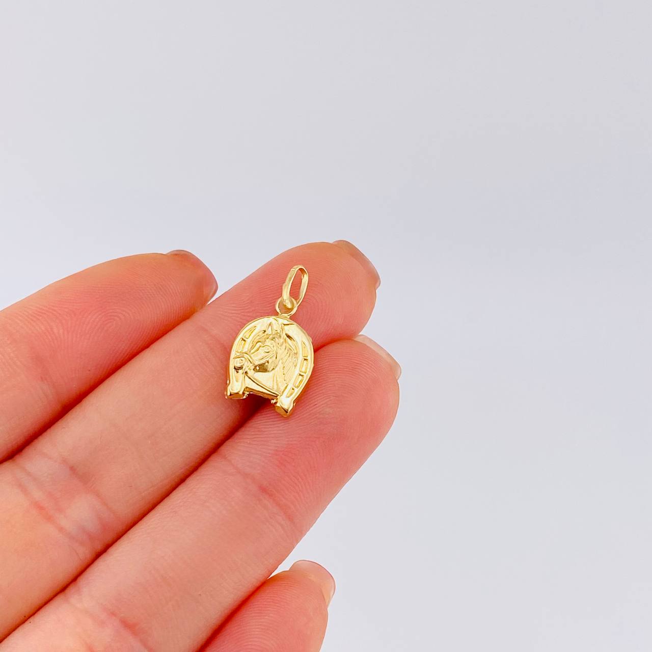 Dije Herradura Caballo 0.7 g / 1.9 cm Oro Amarillo 18K
