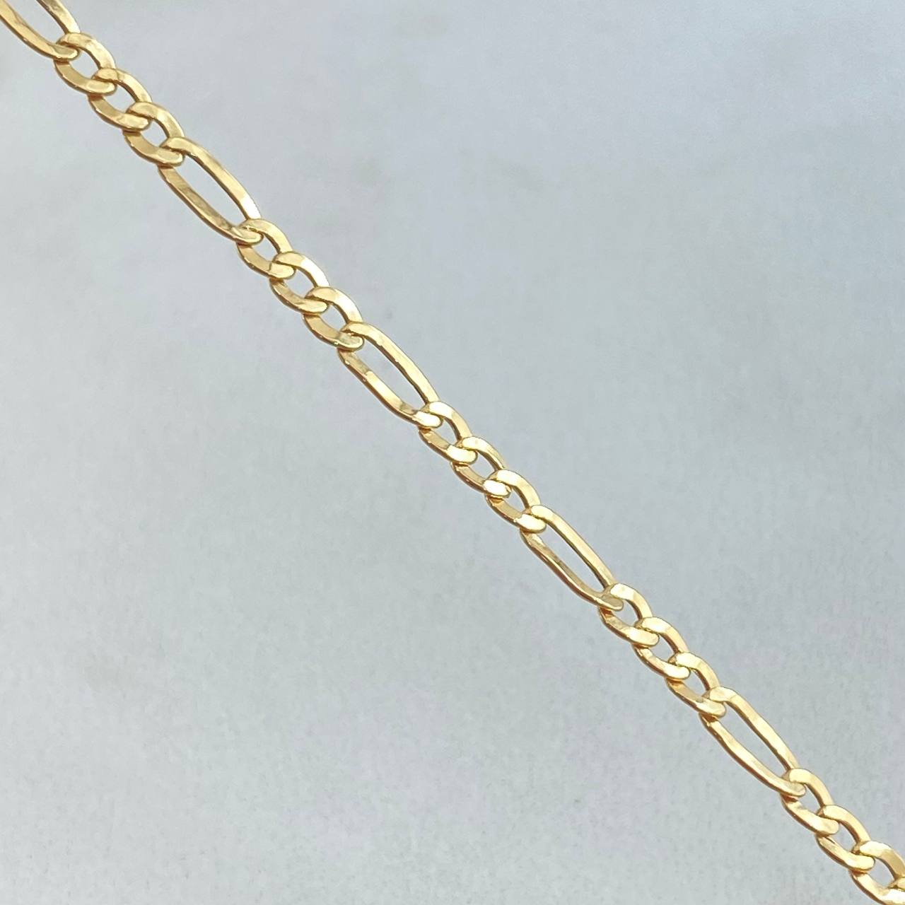Pulso Figaro 1.4gr / 19.5cm / +1 Oro 18K ©