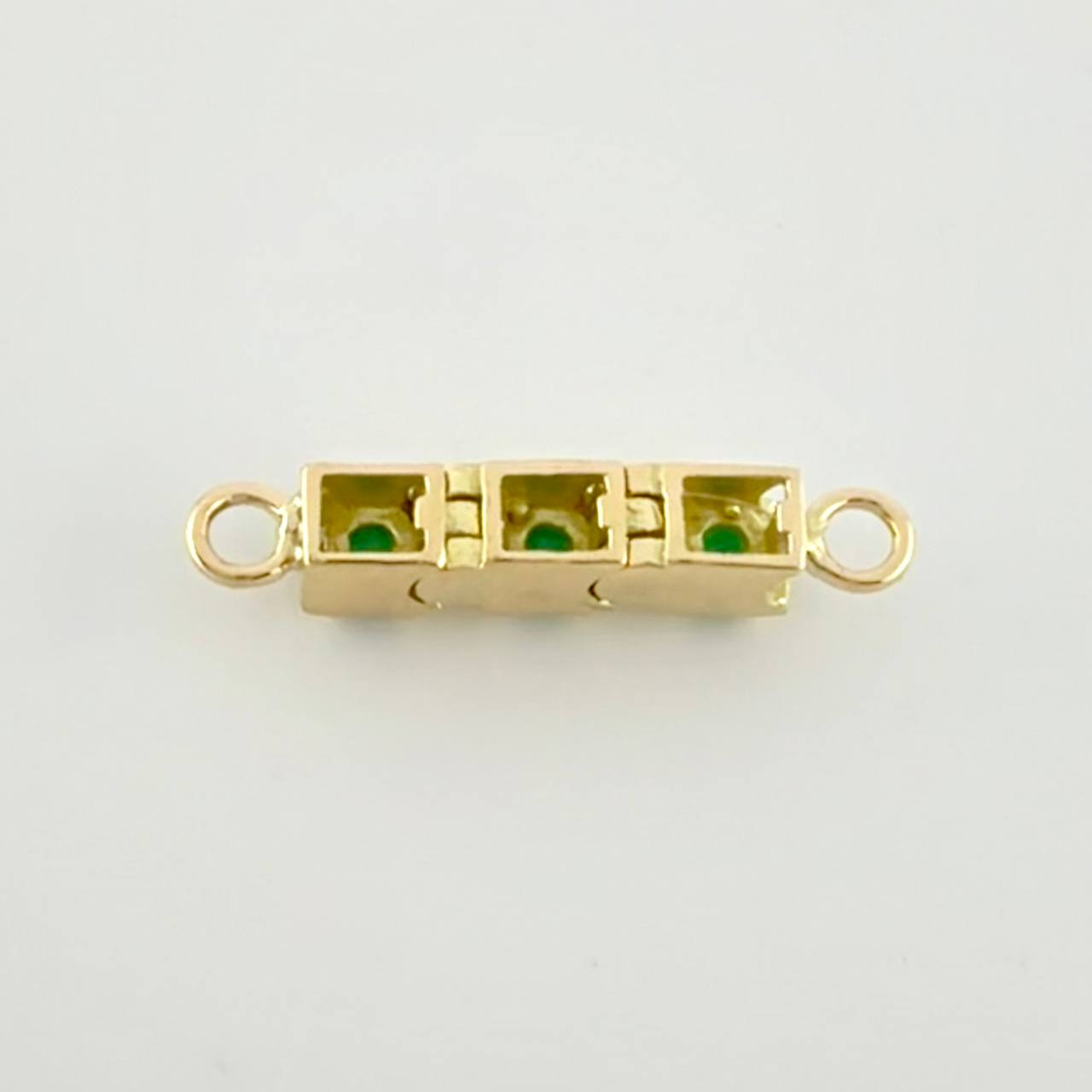 Herraje Trilogía Vertical Esmeraldas 15pts 1.15g / 1.7cm Oro Amarillo 18K