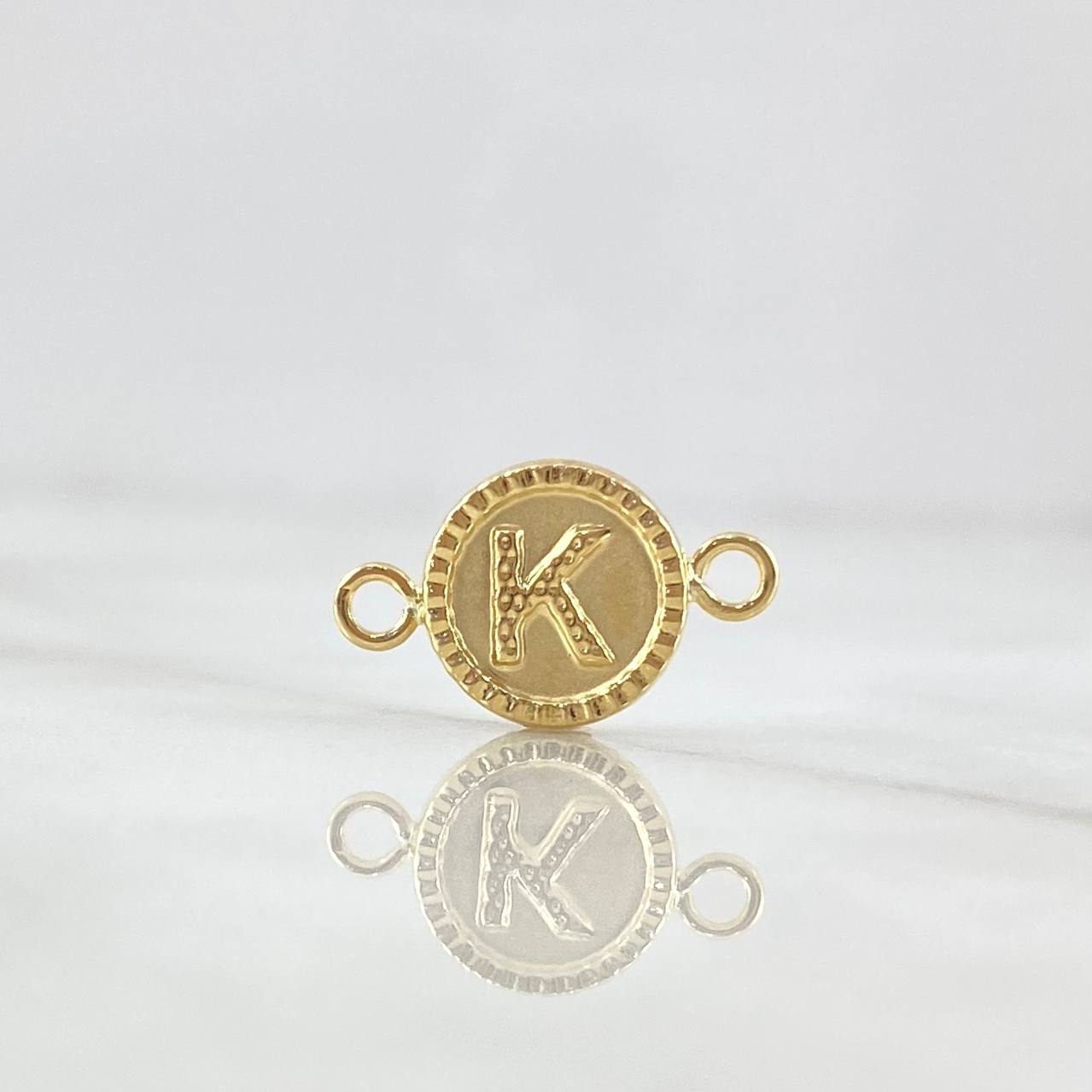 Herraje Letra K Mate 0.65gr / 1.7cm-Circulo Bordeado  Oro Amarillo 18K