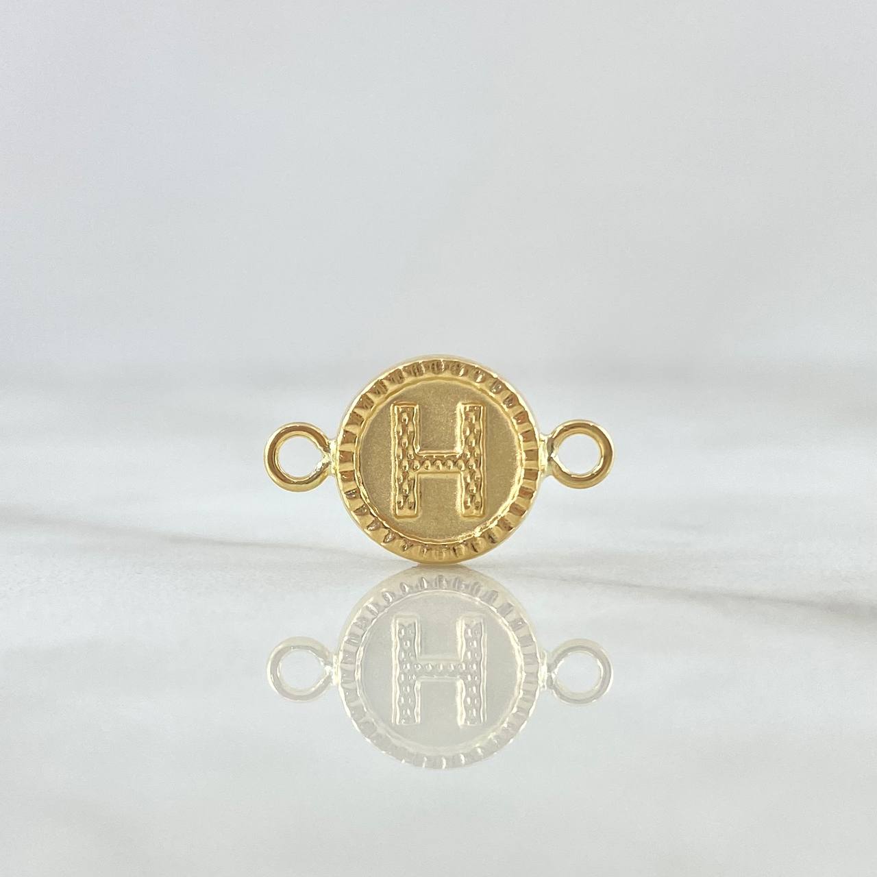 Herraje Letra H Mate 0.55gr / 1.7cm / Circulo Bordeado Oro Amarillo 18K