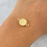 Herraje Letra A Mate 0.6gr / 1.7cm / Circulo Bordeado Oro Amarillo 18K