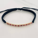 Pulsera Tejida Negra Tennis Oro Amarillo 18K