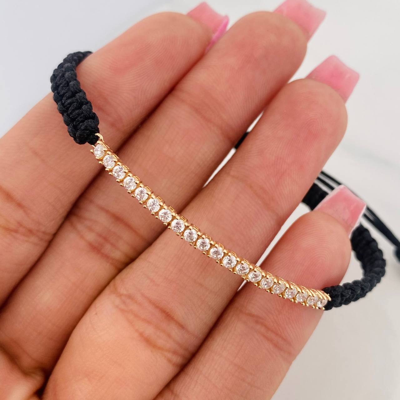 Pulsera Tejida Negra Tennis Oro Amarillo 18K
