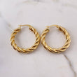 Candongas Luxe 5.2gr / 3cm / Entorchada Oro Amarillo 18K $
