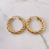 Candongas Luxe 5.2gr / 3cm / Entorchada Oro Amarillo 18K $
