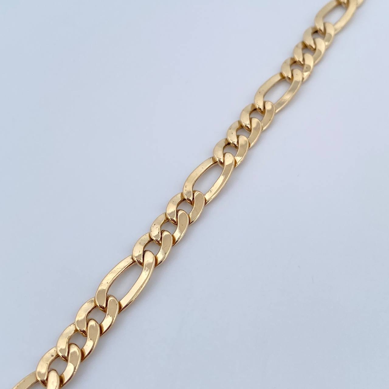Pulso Figaro 8.9gr / 21.1cm / 6.6mm Oro Amarillo +0 18K &