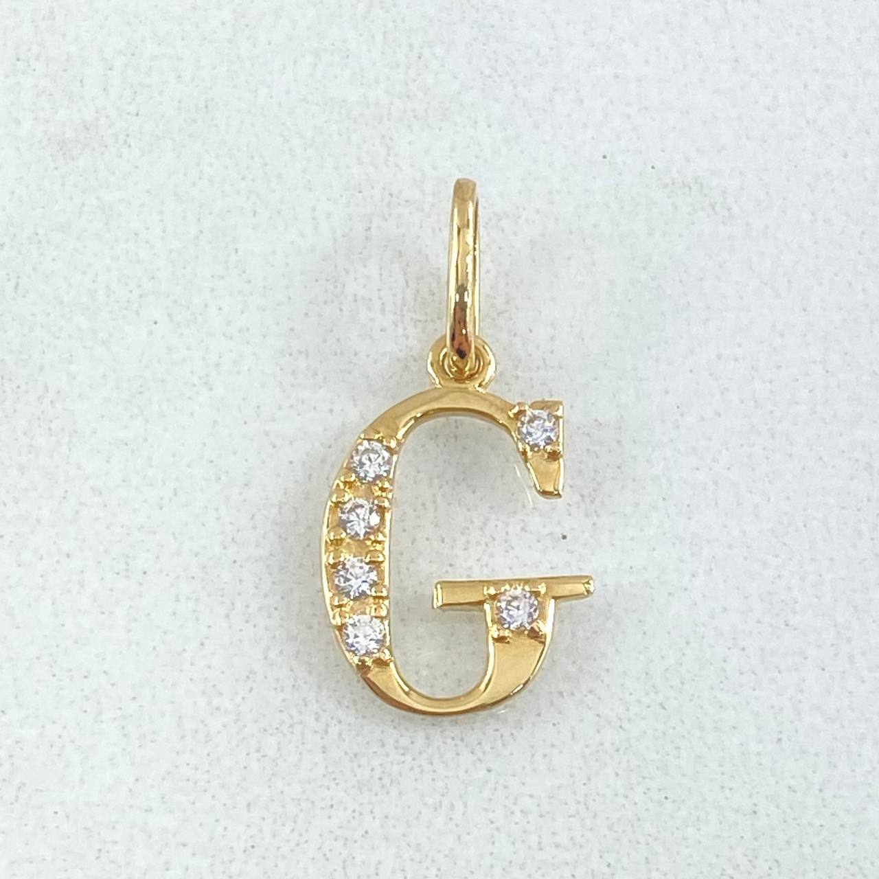 Dije Letra G Silueta 0.7gr / 2cm / Oro 18K