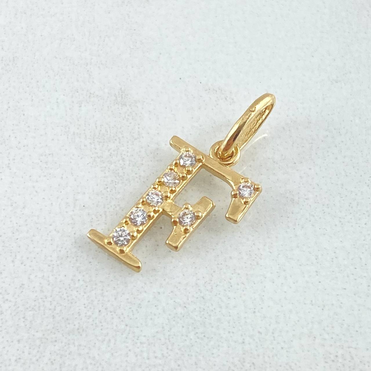 Dije Letra F Silueta 0.85gr / 2cm / Oro 18K