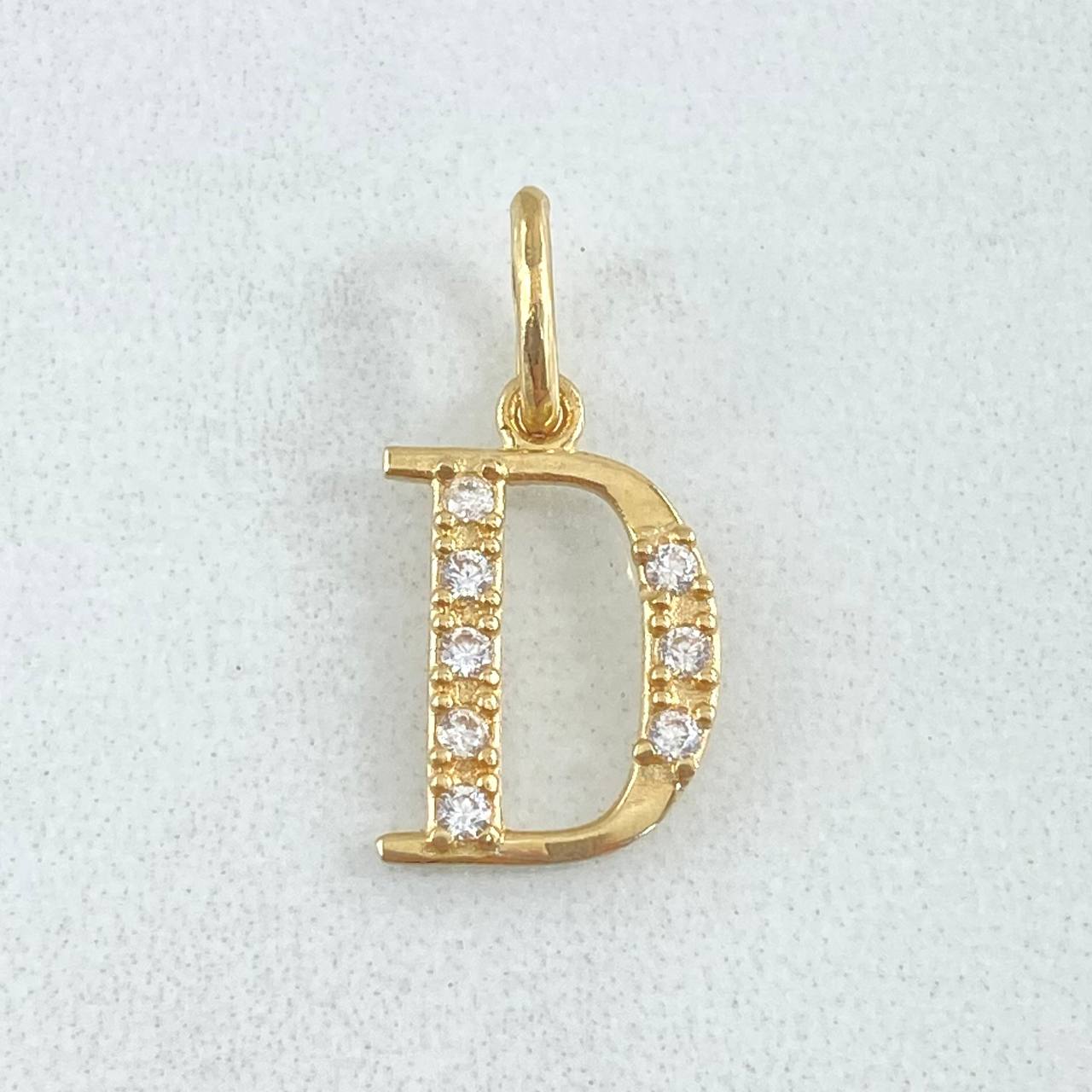 Dije Letra D Silueta 0.85gr / 2cm / Oro 18K