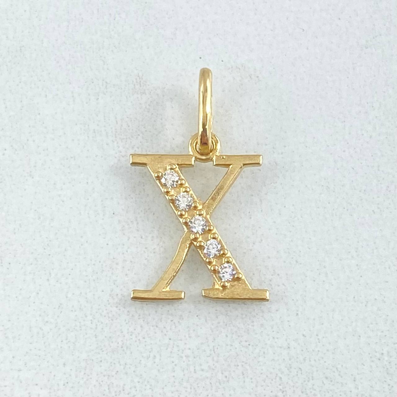 Dije Letra X Silueta 0.85gr / 2cm / Oro 18K