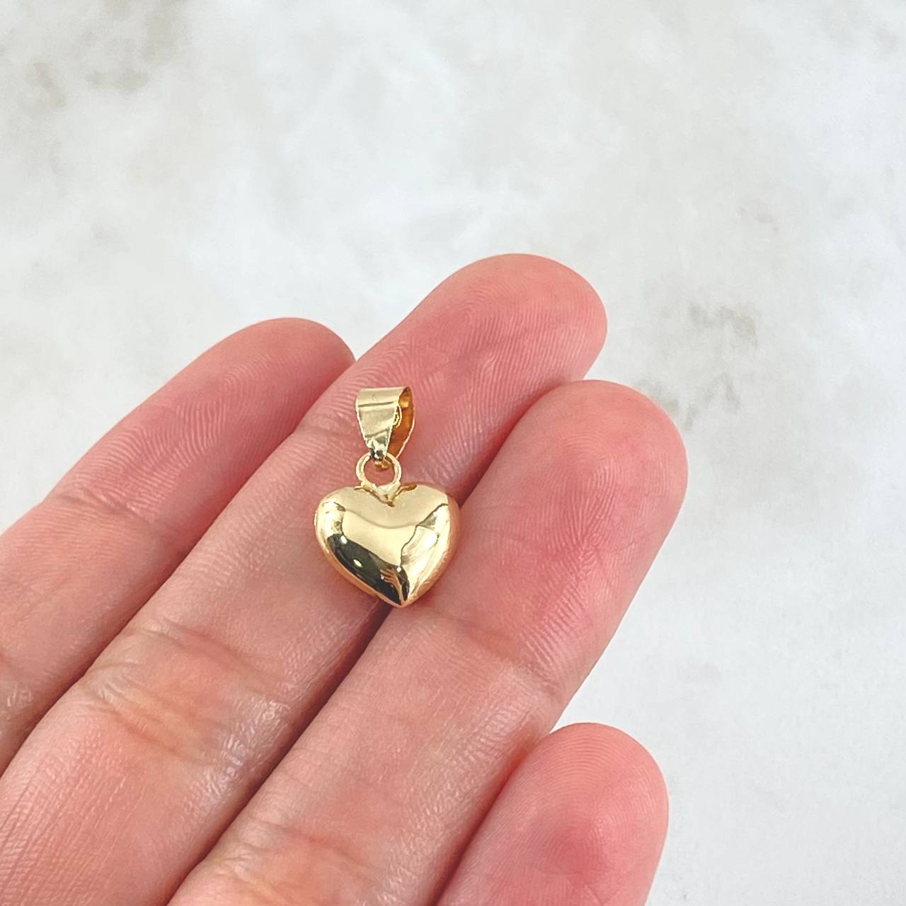 Dije Corazon 0.7gr / 1.8cm / Oro 18K *