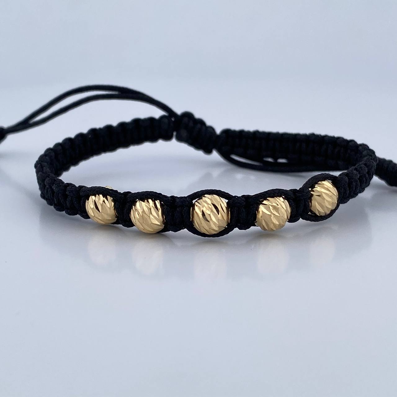 Pulsera Negra Bolas 1gr / Oro 18K &