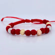 Pulsera Roja Bolas 1.25gr / Oro 18K &