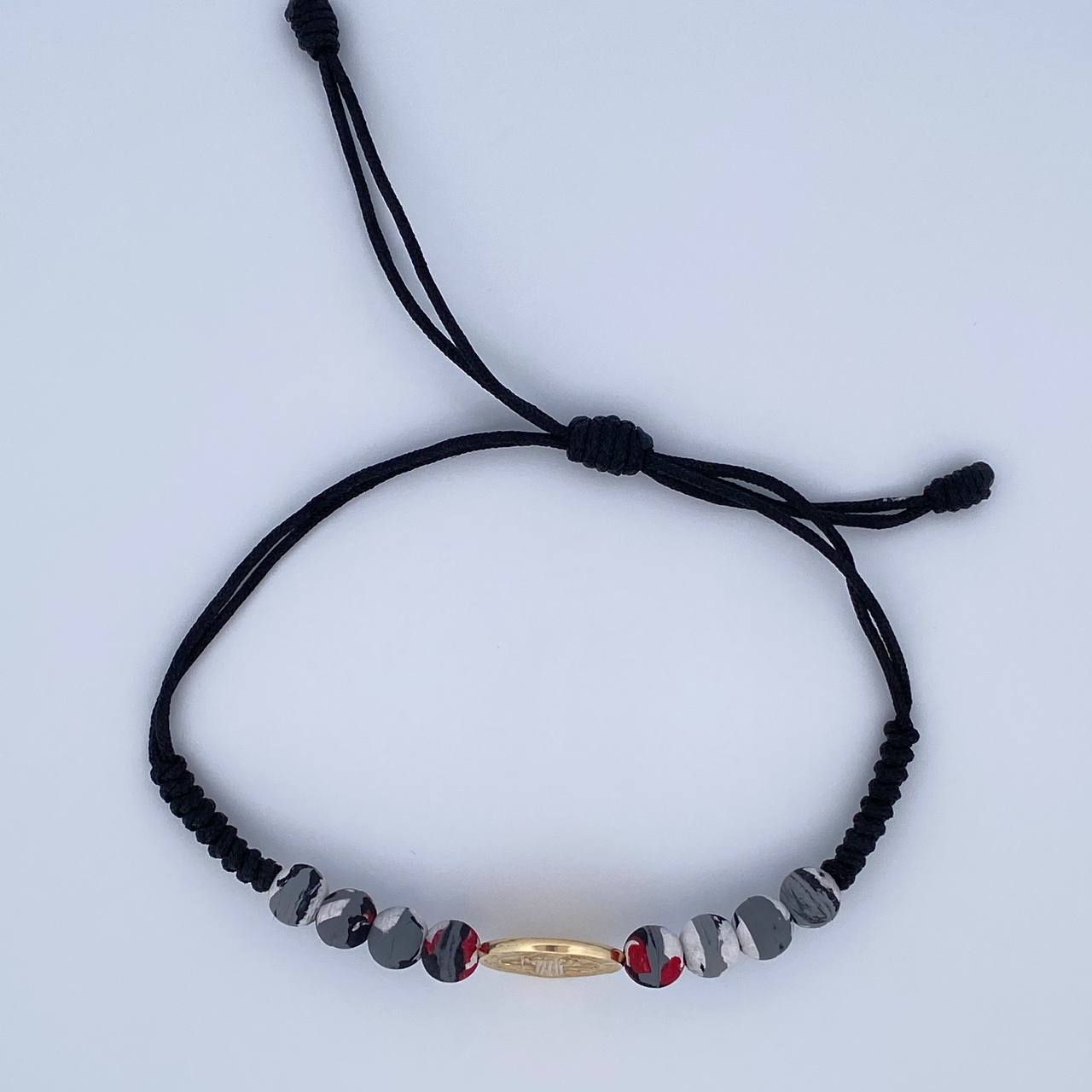 Pulsera Negra San Benito 0.9gr / Oro 18K &