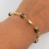 Pulso Rustico Barril 4.8gr / 19.2cm / 4.6mm Cauchos Negros Oro Amarillo 18K &