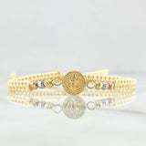 Pulsera Beige Herraje de San Benito 1.1gr / 3mm Bolas Diamantadas Tres Oros 18K