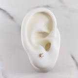 Topos Bicel 0.55gr / Oro Rosa 18K $