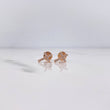 Topos Cruz 0.65gr / Circones Blancos Oro Rosa 18K $