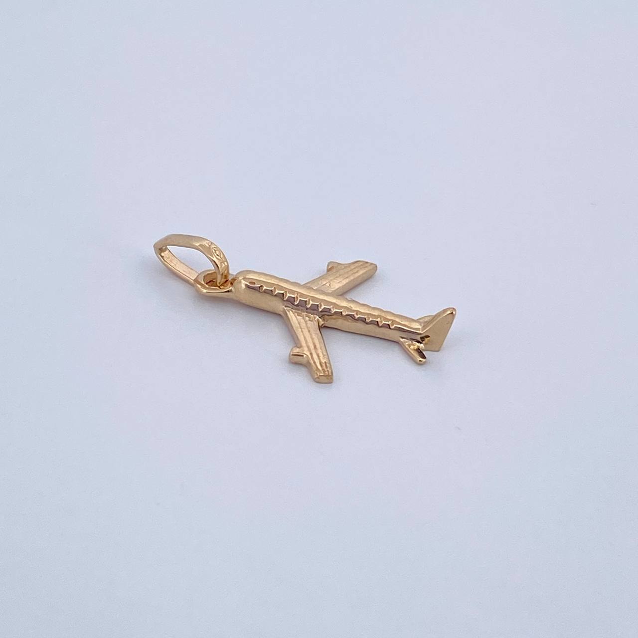 Dije Avion 0.9gr / 2.3cm / Oro Amarillo 18K &