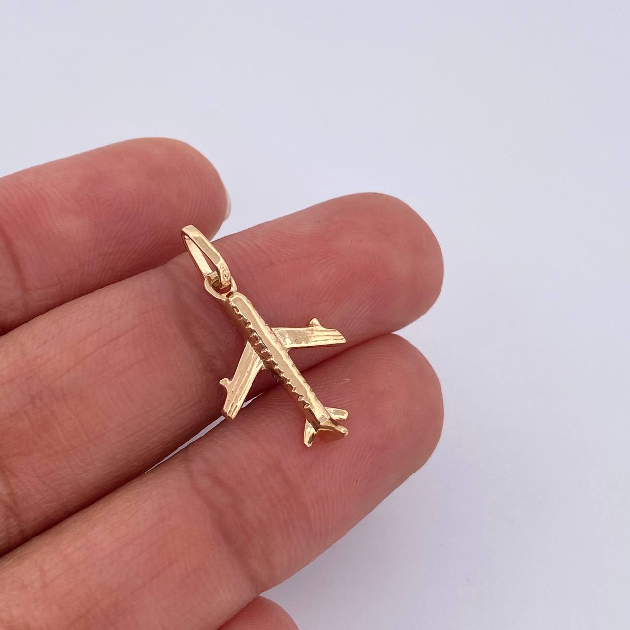 Dije Avion 0.9gr / 2.3cm / Oro Amarillo 18K &
