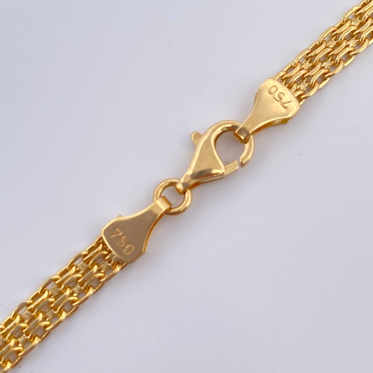 Cadena China 7.65gr / 54.5cm / +1 Oro 18K &