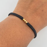 Pulsera Negra 0.15gr / 3mm Bolas Lisas Oro Amarillo 18K (A.C)