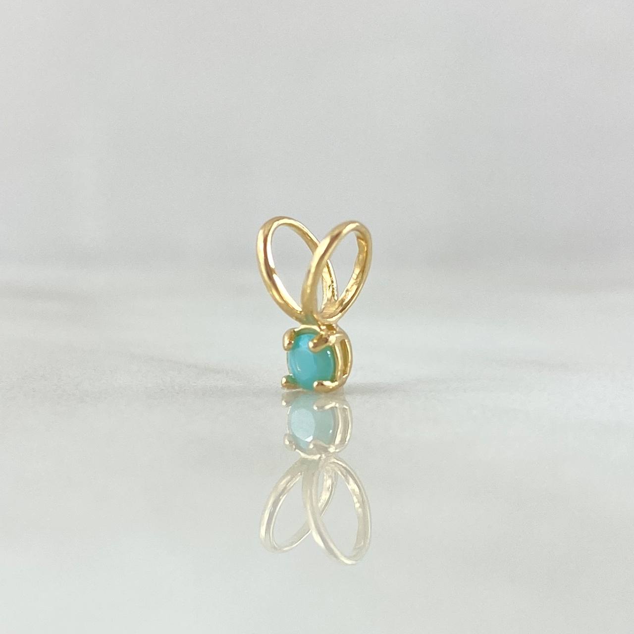 Dije Piedra Regalo 0.35gr / 1cm / Circon Azul Turquesa Oro Amarillo 18K ©