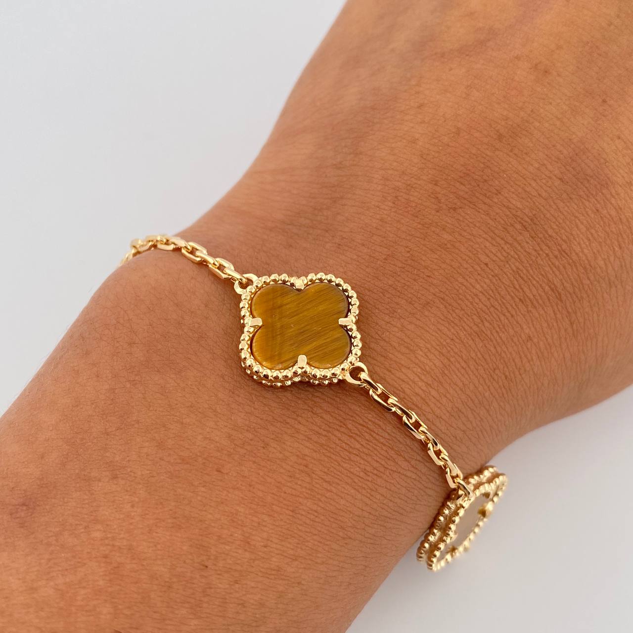 Pulso Aro Seguido Trebol 14.45gr / 21.7cm / 1.9mm Ojo De Tigre Oro Amarillo Nac.Esp. 18K &