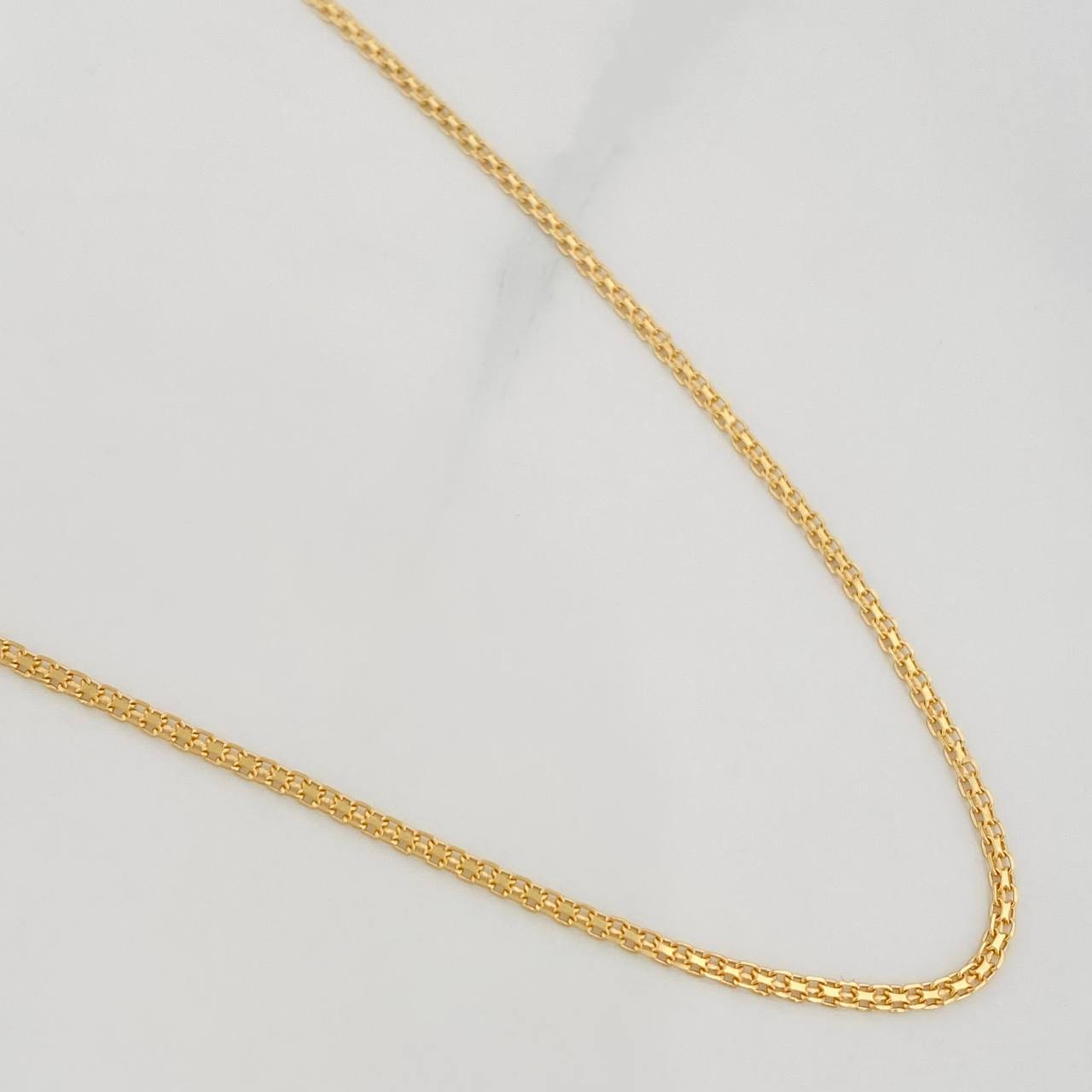 Cadena China 3.1g / 60cm / 1.3mm Oro Amarillo 18K