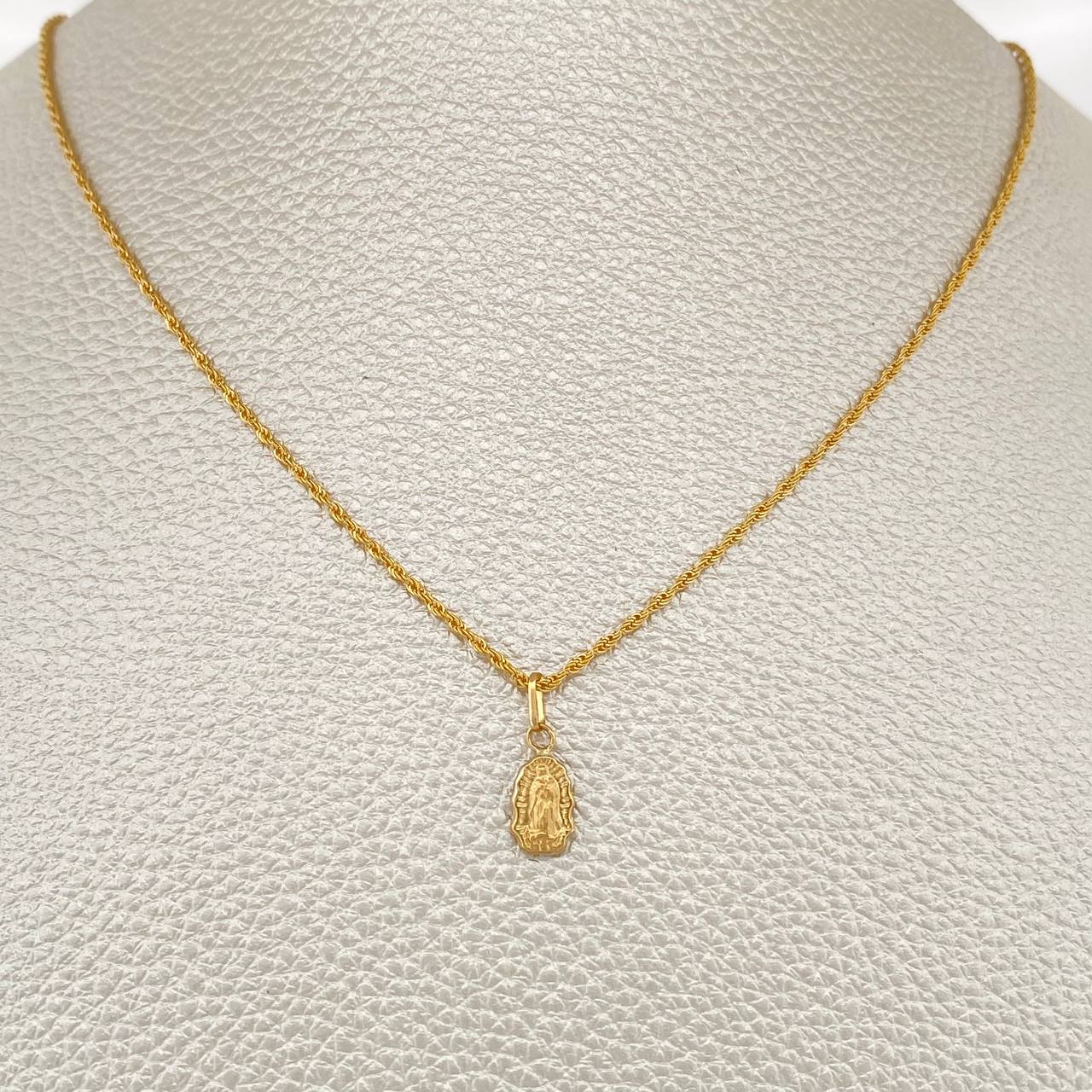 Set Cadena y Dije Lazo + Virgen Guadalupe 1.35gr / 50.3cm / Oro Amarillo 18K (Oferta) $