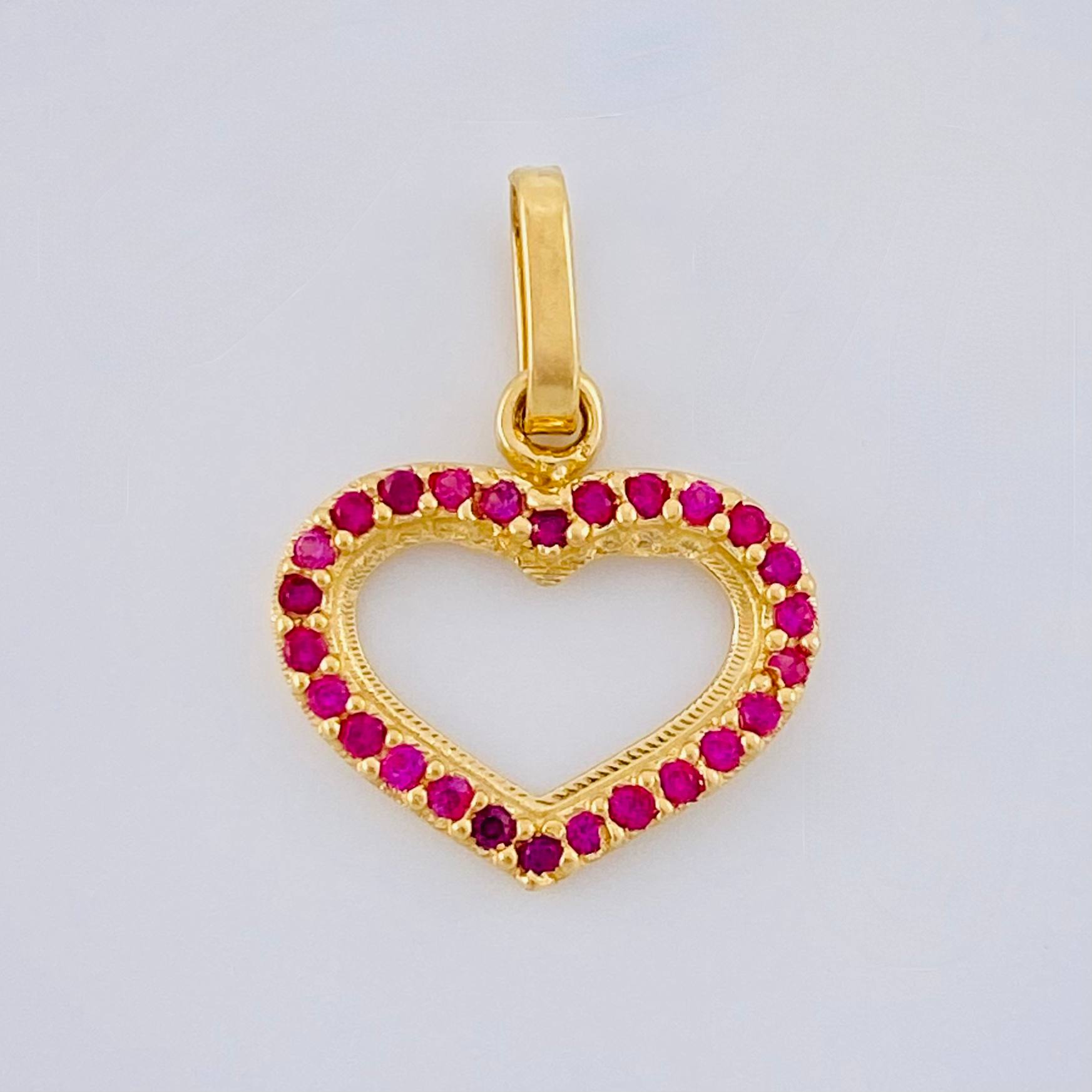 Dije Corazón Silueta 0.85 g / 1.8 cm Oro Amarillo 18K