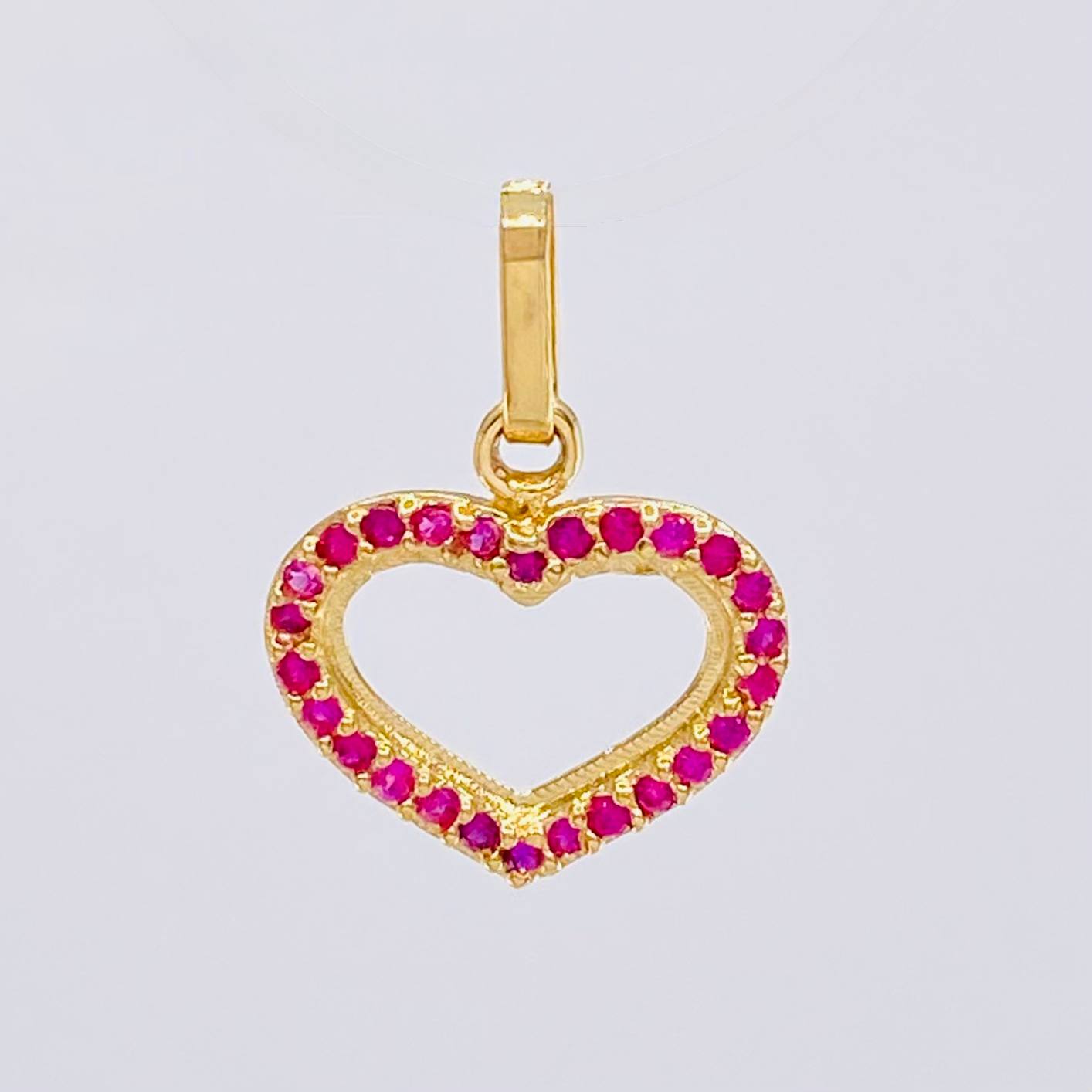 Dije Corazón Silueta 0.85 g / 1.8 cm Oro Amarillo 18K