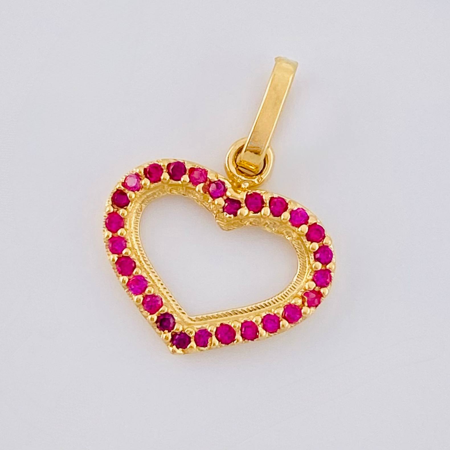 Dije Corazón Silueta 0.85 g / 1.8 cm Oro Amarillo 18K