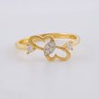 Anillo Corazon Entrelazados 1.4g / T4 1/2 Oro Amarillo 18K