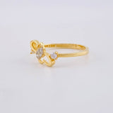 Anillo Corazon Entrelazados 1.4g / T4 1/2 Oro Amarillo 18K