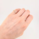 Anillo Corazon Entrelazados 1.4g / T4 1/2 Oro Amarillo 18K