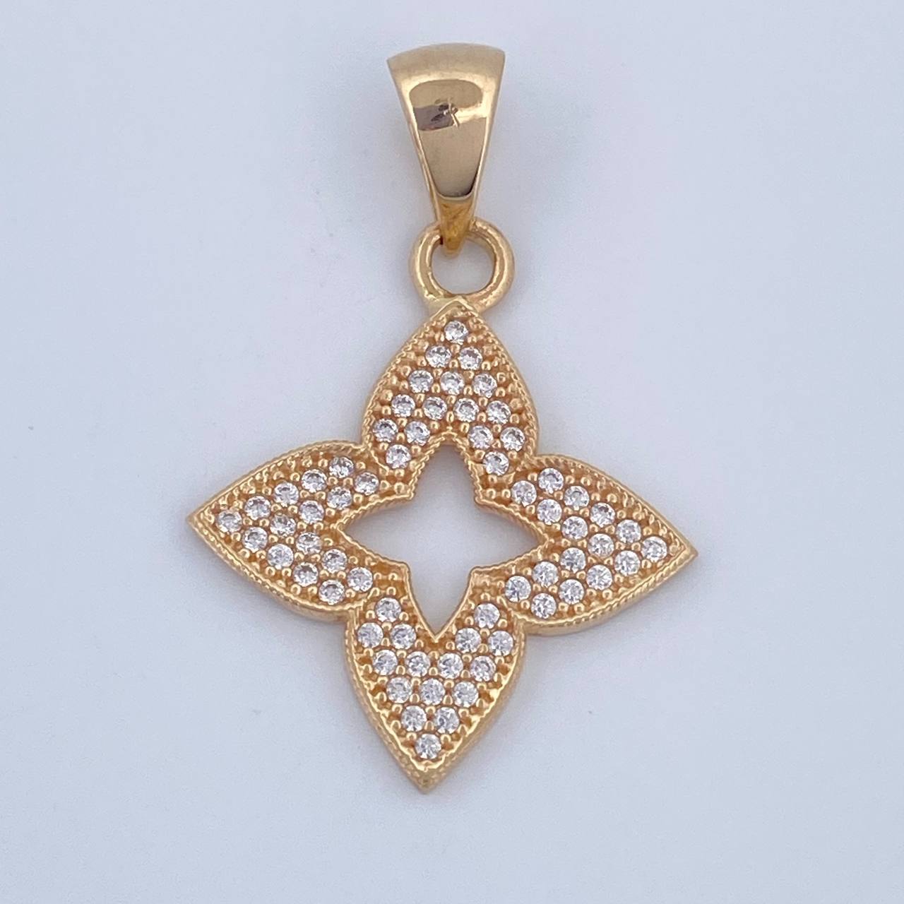 Dije Flor Silueta 2.05gr / 2.8cm / Oro 18K $