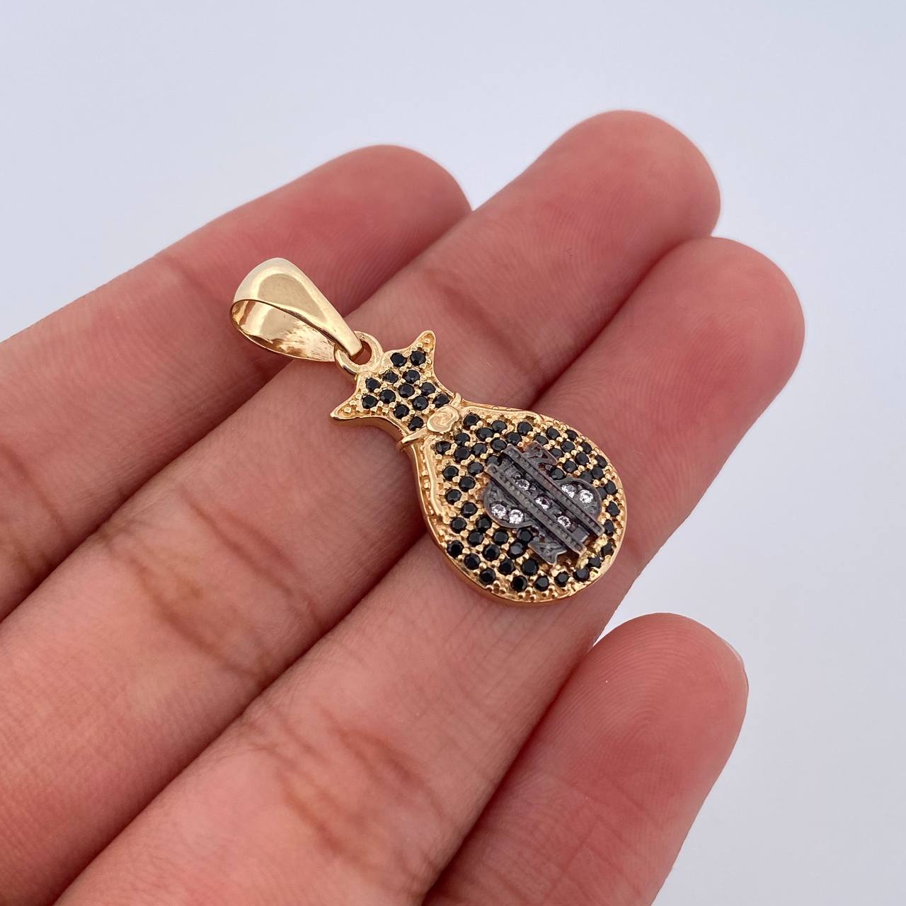 Dije Bolsa Dinero 2.55gr / 3cm / Oro 18K $
