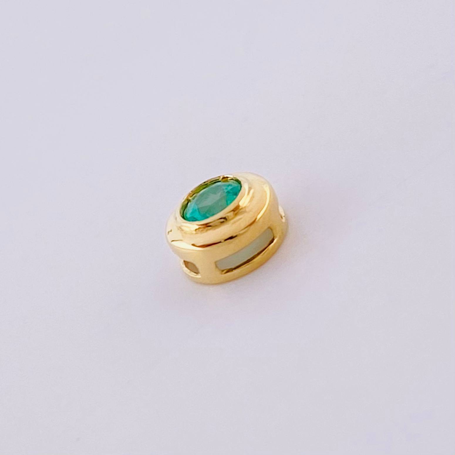Dije Ojo Esmeralda 14pts 0.55g / 0.6cm Oro Amarillo 18K